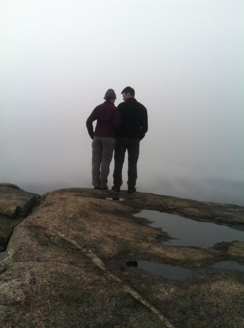 Pondering the view from the summit of Cascade Mountain.